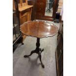 A TWENTIETH CENTURY REPRODUCTION GEORGIAN REVIVAL MAHOGANY TRIPOD TABLE, WITH PIE-CRUST MOULDED TOP,