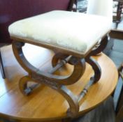 A MAHOGANY X FRAMED STOOL WITH UPHOLSTERED SQUARE SEAT