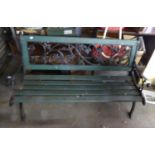 A PAINTED METAL AND SLATTED WOOD GARDEN BENCH