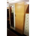 A 1960's G-PLAN WARDROBE IN CREAM AND TEAK WITH TWO DOORS, ONE WITH MIRROR