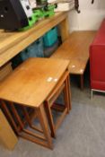 A NEST OF 3 TEAK COFFEE TABLES AND A TEAK COFFEE TABLE (2)