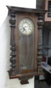 A VIENNA STYLE, MAHOGANY CASED WALL CLOCK, HAVING WHITE DIAL WITH ROMAN NUMERALS (A.F.)