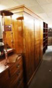 LATE NINETEENTH CENTURY MAHOGANY TRIPLE WARDROBE, HAVING FITTED SINGLE SECTION AND DOUBLE HANGING
