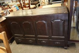 A NINETEENTH CENTURY MULE CHEST, HAVING 4 PANELS OVER 2 DRAWERS AND LIFT-UP HINGED LID