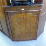 A GEORGE V BURR WALNUTWOOD CORNER CABINET