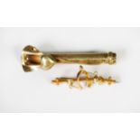 9ct GOLD BAR BROOCH, with bone and flowers, 1.3gms gross; a silver gilt pin fastening FOB POSY