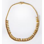 MIDDLE EASTERN GOLD COLOURED METAL ROPE CHAIN NECKLACE, with a fringe of 37 boteh shaped drops,