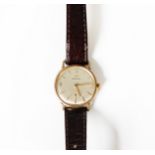 GENT'S MARVIN GOLD WRISTWATCH with mechanical movement, circular silvered dial with subsidiary