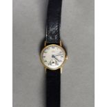 LADY'S 18ct GOLD CASED VINTAGE WRISTWATCH, with mechanical movement, silvered round arabic dial with