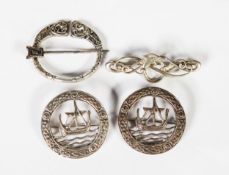 PAIR OF SCOTTISH CAST SILVER CELTIC BROOCHES, the openwork centres depicting a Viking longboat