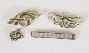 THREE SCOTTISH SILVER BROOCHES, viz a Celtic knot; a stylised wading bird and a small foliate