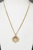 18ct GOLD PENDANT SET WITH 43 TINY DIAMONDS, on an 18ct GOLD flattened-link chain, 11.8 gms gross