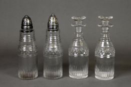 SET OF FOUR ANTIQUE CUT GLASS CONDIMENT BOTTLES, pepper and salt, with hallmarked silver tops (marks