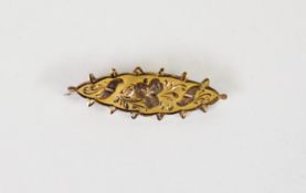 EDWARDIAN 9ct GOLD LOZENGE SHAPED BROOCH, embossed with bright foliage on a matt background, 1 1/2in