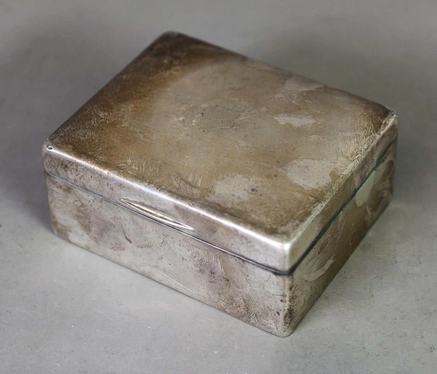 SILVER CASED TABLE CIGARETTE BOX BY MAPPIN & WEBB, of typical form with hardwood lined interior,
