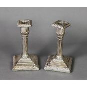 4 PAIR OF VICTORIAN SILVER NEO-CLASSSICAL DWARF CANDLESTICKS, with reeded columns Sheffield 1894