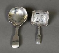 TWO NINETEENTH CENTURY SILVER CADDY SPOONS, comprising: a George III example, engraved and with