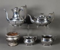 FOUR PIECE ELECTROPLATED TEA AND COFFEE SET, of rounded oblong, part fluted form with black