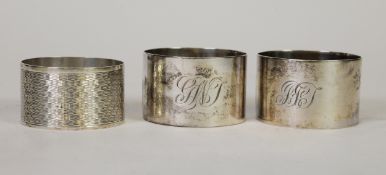PAIR OF PLAIN BROAD CIRCULAR NAPKIN RINGS, initalled, Birmingham 1944 and a sterling silver engine