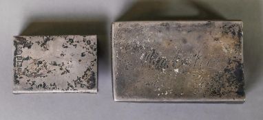 TWO SILVER MATCH BOX HOLDERS, one inscribed ‘MATCHES’ to the top, 2 ½” x 1 ½” (6.3cm x 3.8cm), marks