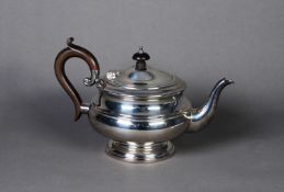 GEORGE V BACHELORS SILVER TEAPOT BY ROBERTS & DORE, of bellied form with brown scroll handle and