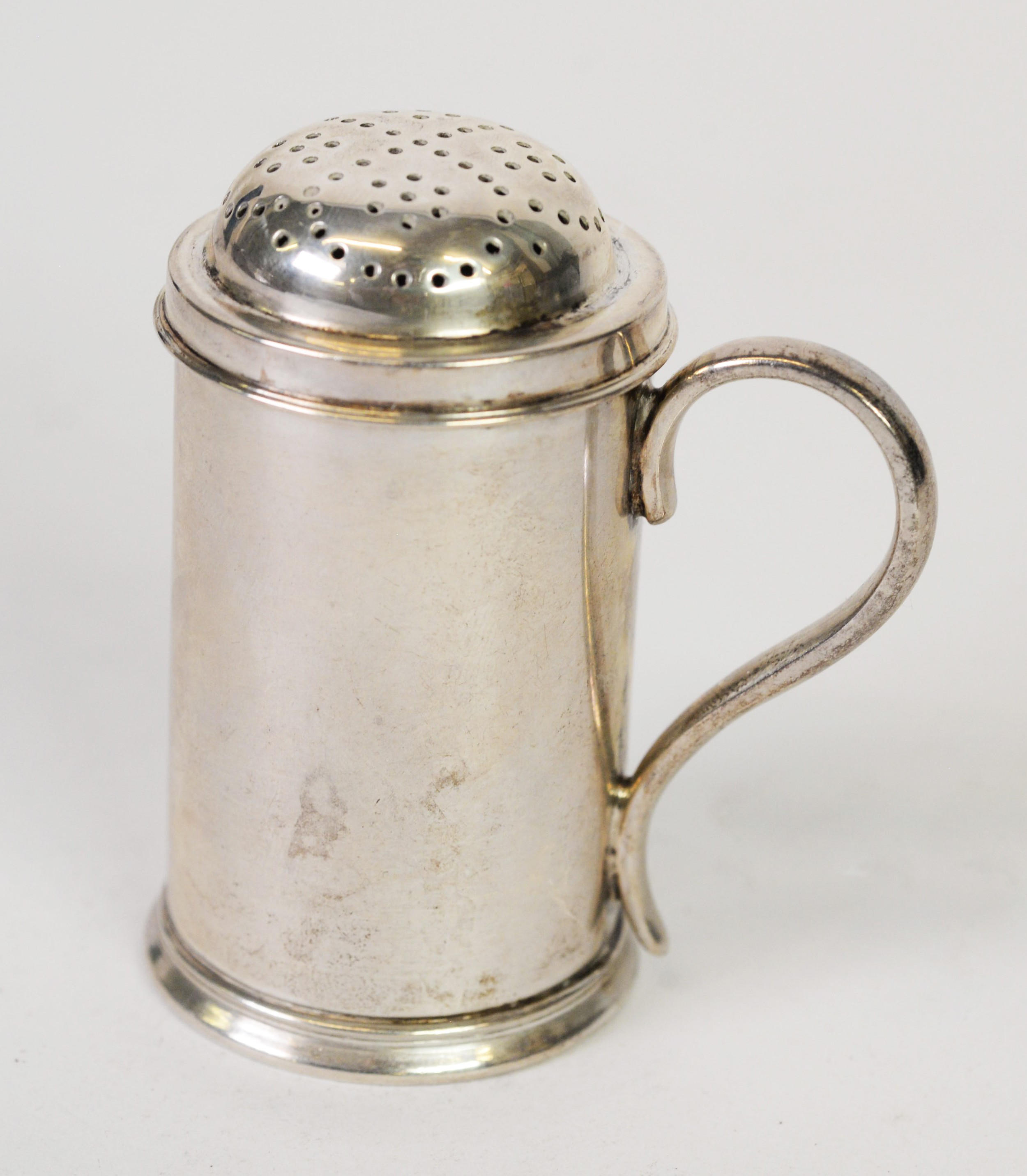 VICTORIAN SILVER TANKARD SHAPED PEPPERETTE with pierced domed lid, S scroll strap handle, 2 3/4in (