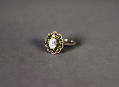 9ct GOLD CLUSTER RING, set with a centre oval white stone and surround of small white stones in a
