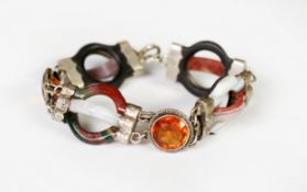 VICTORIAN SILVER AND SCOTCH PEBBLE FANCY LINK BRACELET, of agate hoops and two collet set