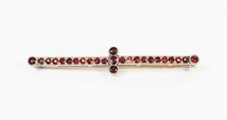 WHITE METAL BAR BROOCH set with twenty two small red stones and cross set with three slightly larger