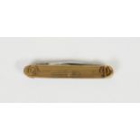 9ct GOLD CASED PENKNIFE with a folding bale at each end, engine turned decoration, initialled G.W.