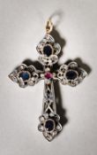 NINETEENTH CENTURY PROBABLY ITALIAN GOLD and SILVER PENDANT CRUCIFIX set with FOUR SAPPHIRES, a RUBY