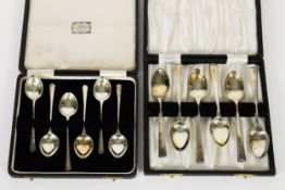 SET OF SIX SILVER COFFEE SPOONS, with narrow fan shaped handles, in case inscribed F.E.