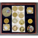 Case containing two gold plated ‘British Bank Note’ COMMEMORATIVE MEDALLIONS; eight gold plated COIN