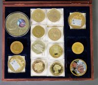 Case containing two gold plated ‘British Bank Note’ COMMEMORATIVE MEDALLIONS; eight gold plated COIN