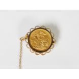 VICTORIAN 1893 GOLD FULL SOVEREIGN, loose mounted in a 9ct gold frame as a brooch with safety chain,