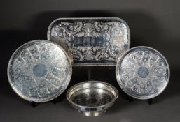 THREE ELECTROPLATED GALLERIED TRAYS WITH SCROLL CHASED CENTRES BY VINERS, one of rounded oblong
