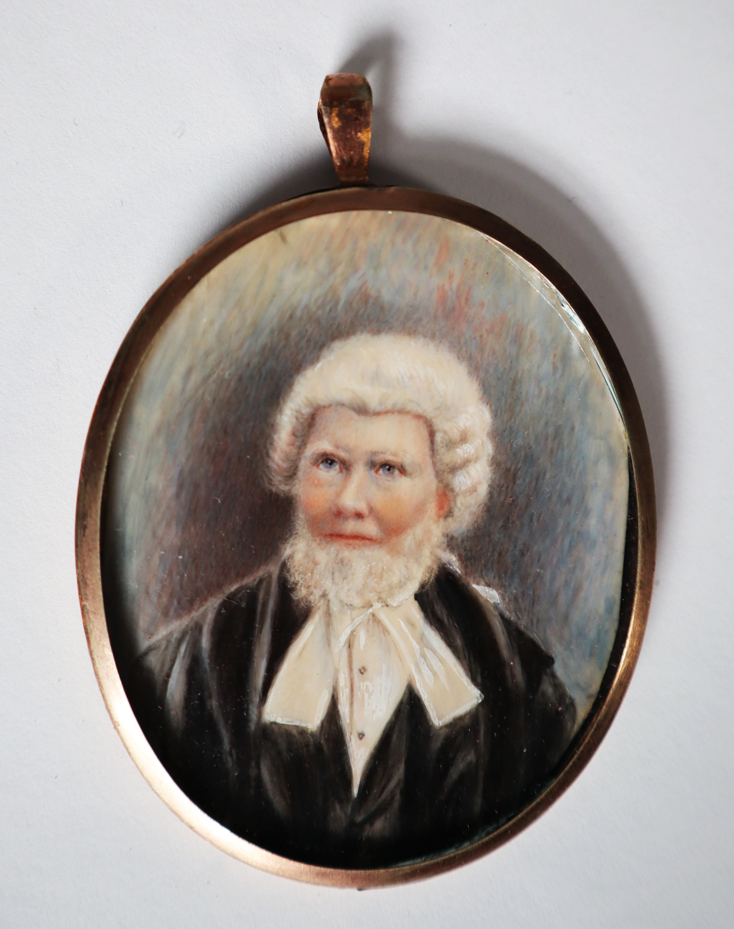 MID TO LATE NINETEENTH CENTURY OVAL PORTRAIT MINIATURE ON IVORY OF A BARRISTER OR KING’S COUNSEL,