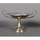 EDWARD VII SILVER TWO HANDLED PEDESTAL BON BON DISH, of shallow, lipped form with high scroll