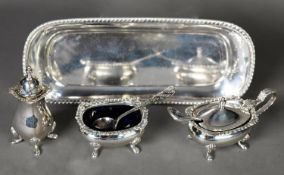 THREE PIECE GEORGIAN STYLE SILVER CONDIMENT SET BY A E JONES, with shell capped gadrooned border and