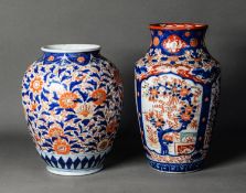 TWO JAPANESE MEIJI PERIOD IMARI PORCELAIN VASES, one of footed baluster form, 11 ½” (29.2cm) high,