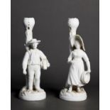 PAIR OF NINETEENTH CENTURY DERBY WHITE GLAZED PORCELAIN FIGURAL CANDLESTICKS, modelled as a rustic