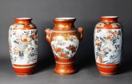 THREE JAPANESE KUTANI PORCELAIN VASES, one of two handled baluster form with bird mask capped