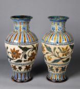 PAIR OF DOULTON LAMBETH MOULDED POTTERY VASES, each of tapering form with short cylindrical neck and