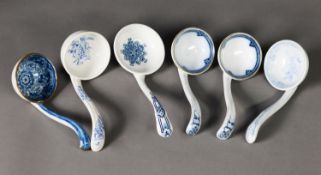 A COLLECTION OF SIX 19TH CENTURY CERAMIC LADLES, mainly early to mid-19th century, though a pair
