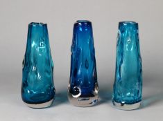THREE WHITEFRIARS KNOBBLY GLASS VASES IN BLUE, of slightly tapering form, one slightly darker in