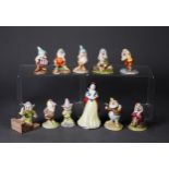 ELEVEN  ROYAL DOULTON SNOW WHITE AND DWARF FIGURINES, 2 x Doc, 2 x Dopey & 2 x Sleepy, Disney