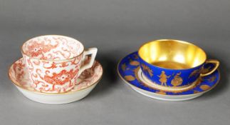 NINETEENTH CENTURY MINTON CABINET CHINA TEA CUP AND SAUCER, red printed with Oriental scroll work,