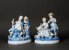 PAIR OF EARLY TWENTIETH CENTURY KPM STYLE PORCELAIN GROUPS, each heightened in blue and modelled