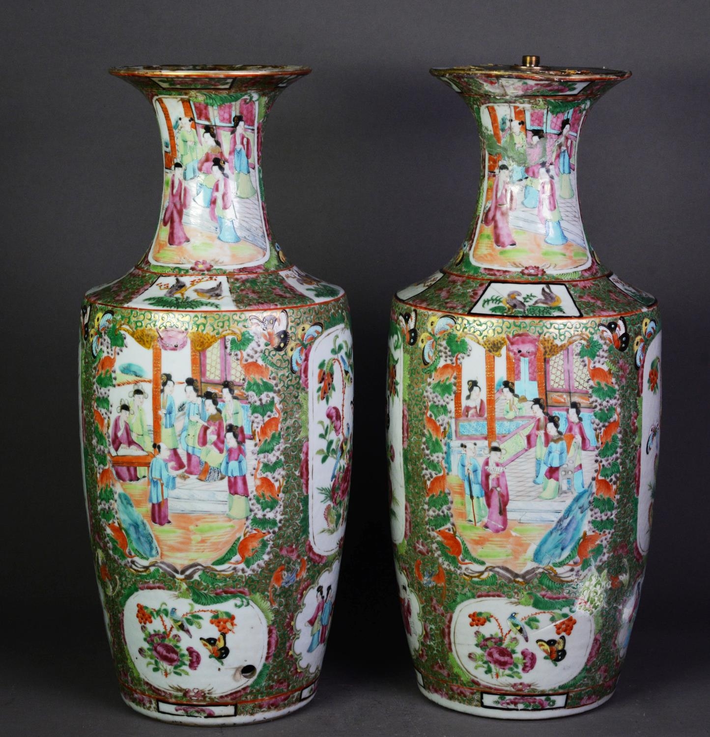 PAIR OF CHINESE LATE QING DYNASTY CANTON DECORATED VASES, the oviform bodies beneath waisted