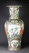 A VERY LARGE CHINESE REPUBLICAN PERIOD PORCELAIN FAMILLE ROSE BALUSTER VASE, the reserves with